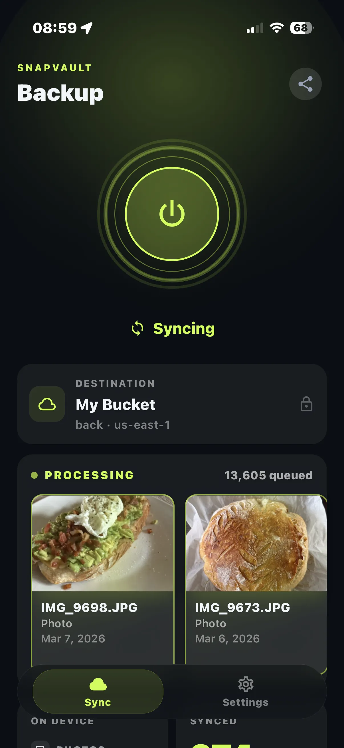 SnapVault app showing a photo backup in progress